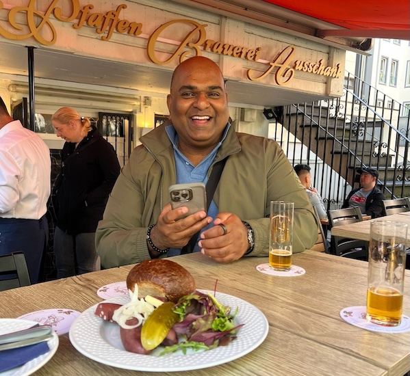 Smiling over food in Cologne